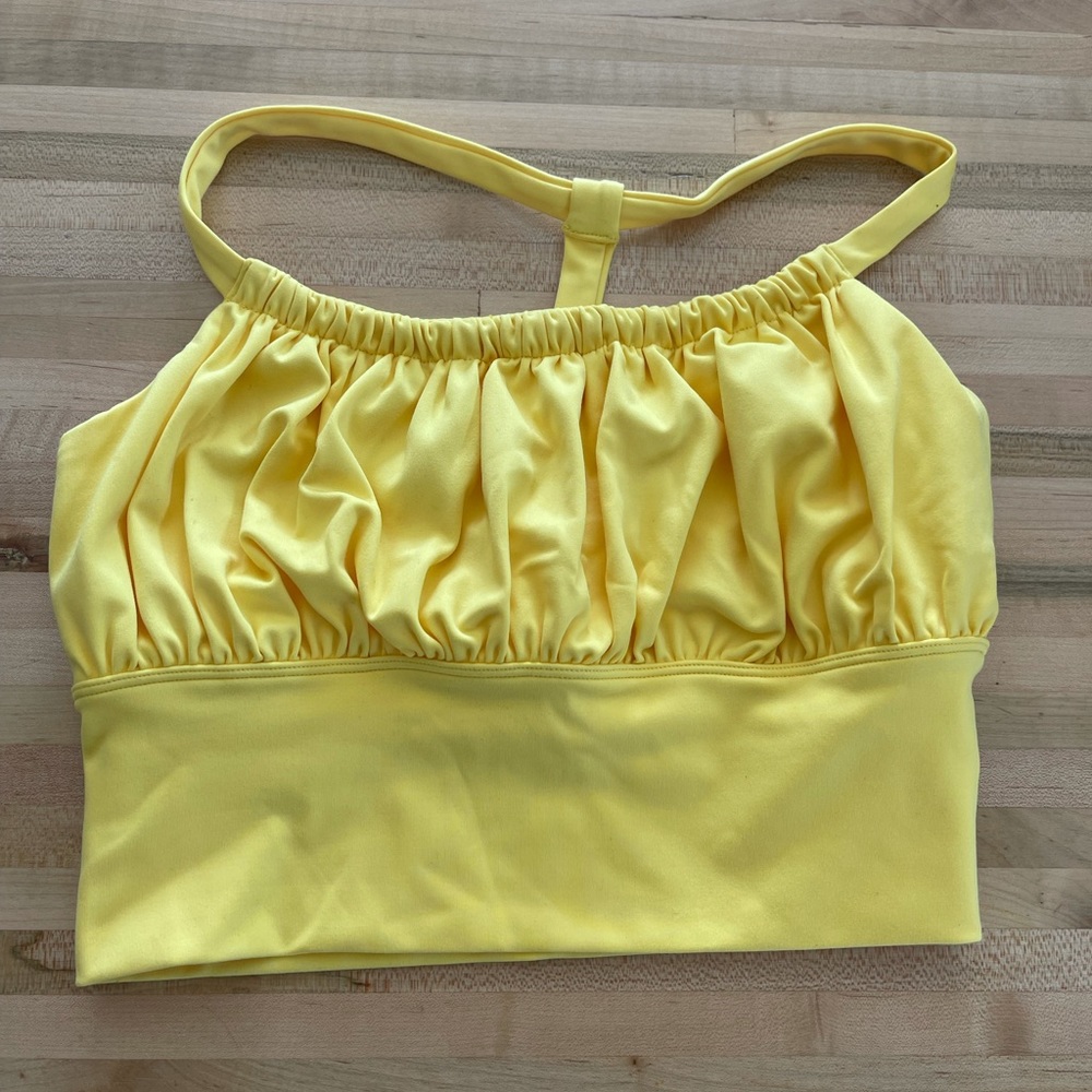Yellow touched crop bra with built in bra.
